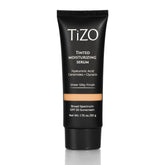 TIZO tinted moisturizing serum bottle highlighting SPF 30 protection on skin