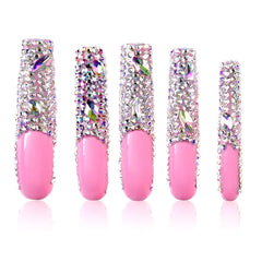 Tmani extra-long press-on nails with diamond glitter in ballet-square shape for a glamorous party look.