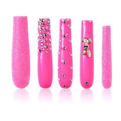 Tmani extra-long press-on nails for a dramatic, salon-style look.