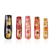 Tmani long nails with obsidian crystal finish for a bold party-ready look