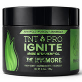 TNT Pro Ignite Sweat Cream bottle closeup promoting pre-workout warming for active workouts.