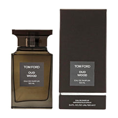 Tom Ford Oud Wood bottle front showing luxury fragrance presentation.