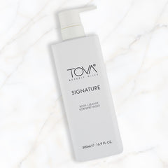 Fragrance swirl highlights Tova Signature notes, offering a refreshing floral scent.