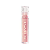 Tower 28 ShineOn Milky Lip Jelly OAT bottle showing silky non-sticky shine