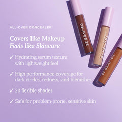 Tower 28 Swipe Serum Concealer applicator in use for precise application.