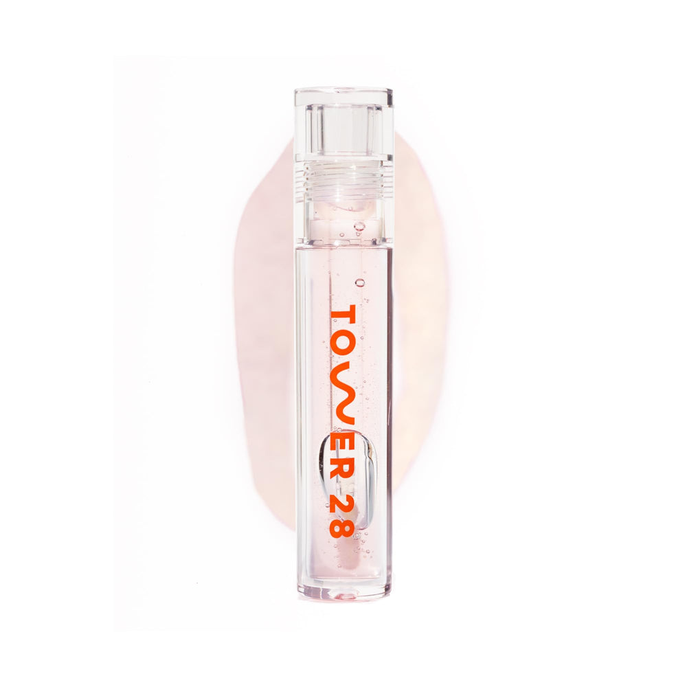 Tower 28 ShineOn Lip Jelly Chill bottle closeup shows transparent shine and hydration