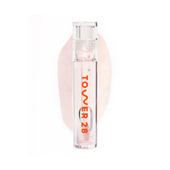 Tower 28 ShineOn Lip Jelly Chill bottle closeup shows transparent shine and hydration