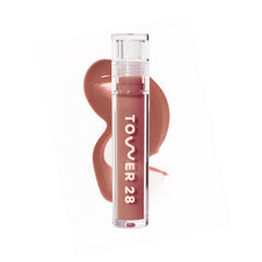 Tower 28 ShineOn Milky Lip Jelly Cashew swatch on lips for a milky rosy shade.
