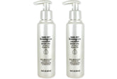 Trader Joe's lemongrass coconut body oil bottle, lemony scent, light hydration for skin.