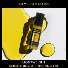 TRESemmé Lamellar Gloss Oil on damp hair shows cuticle sealing for frizz control.