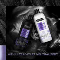 TRESemmé Purple Blonde Conditioner applied to wet hair for detangling and manageability.