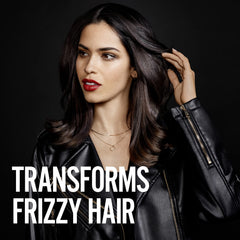 Conditioner applied evenly through wet hair for detangle