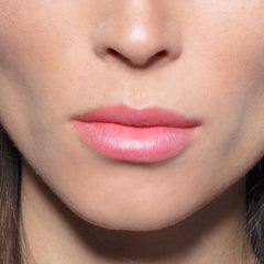 TRE'STIQUE Prime And Shine Lip Primer close-up highlighting soft-focus base