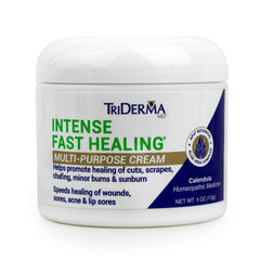 TriDerma Intense Fast Healing Cream tube closeup showing smooth texture and ease of application.