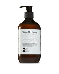 TRIUMPH & DISASTER conditioner bottle highlights keratin hydration for dry, damaged hair.