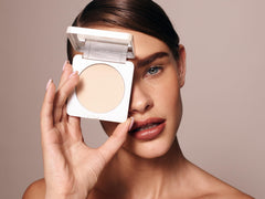 Swatch of True + Luscious Sheer Halo Powder showing sheer-to-medium coverage