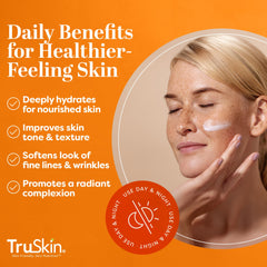 TruSkin Vitamin C Cream application on fingertips for quick hydration.