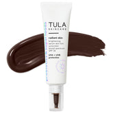 TULA radiant skin brightening serum SPF 30 bottle showing luminous finish and glow