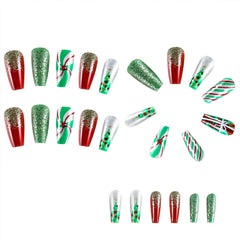 TULOBI nails featuring green and red stripes for holiday style.