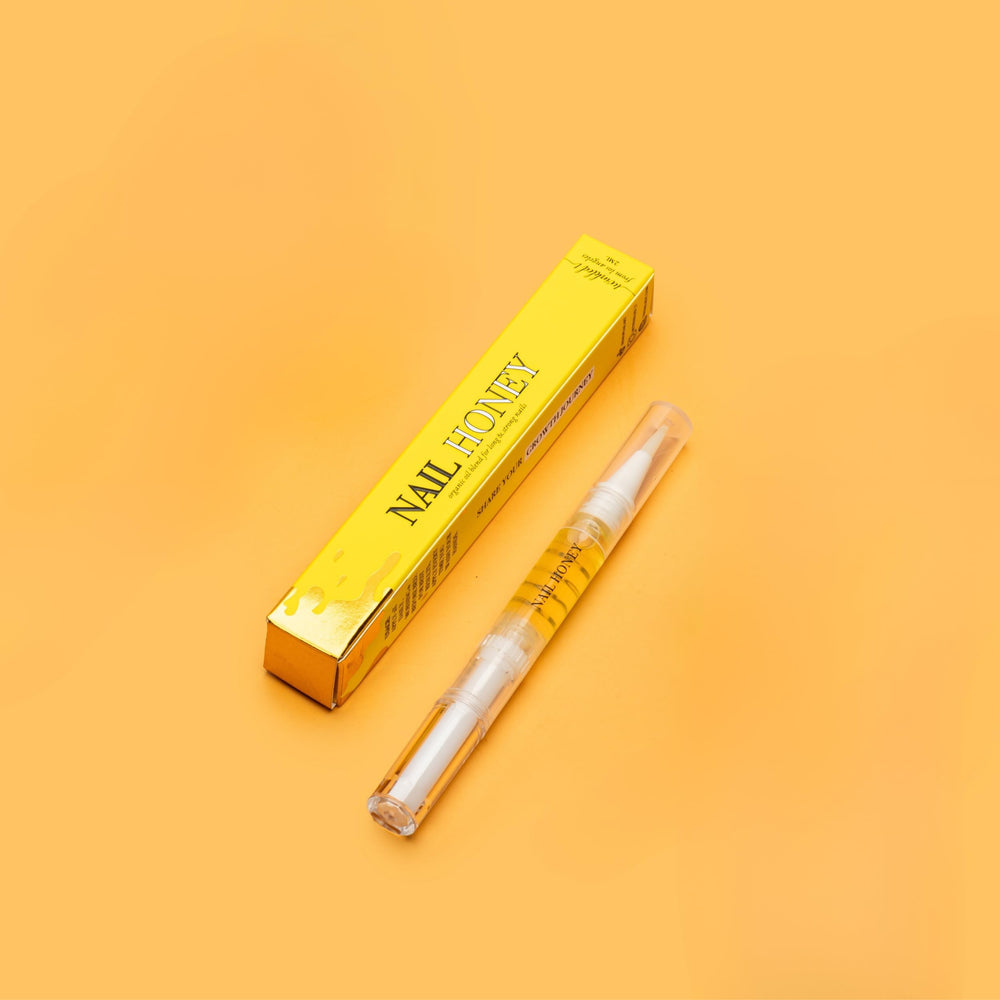 Twinkled T Nail Honey bottle cap close-up showing organic ingredients for nourishing nails.