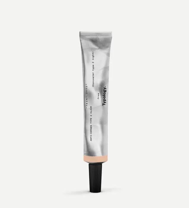 Typology Tinted Concealer Type 2 Light bottle-pump for under-eye coverage and brightening.