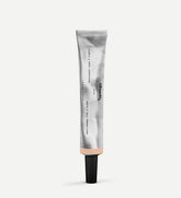 Typology Tinted Concealer Type 2 Light bottle-pump for under-eye coverage and brightening.