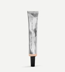 Typology Tinted Concealer Type 2 Light bottle-pump for under-eye coverage and brightening.