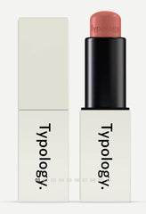 Typology tinted replenishing lip balm powder pink in tube for hydrated, soft lips.