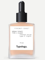 Typology tinted serum bottle front for a light, natural finish