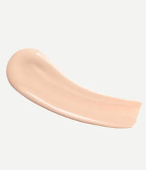 TYPOLOGY Tinted Serum brush application showing even coverage for a radiant complexion