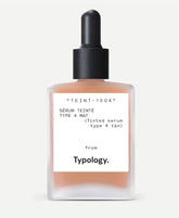 Typology tinted serum bottle for Type 4 tan skin delivering radiance with vitamin C.