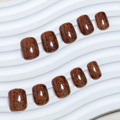 Tyuimhx brown glitter square nails during application for quick, salon-like results.