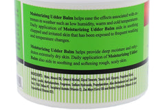 Hands applying The Happy Cow Udder Balm for moisturized skin and protection.