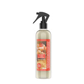 Uhuru Naturals Hair Growth Spray applied to scalp for refresh and potential fullness