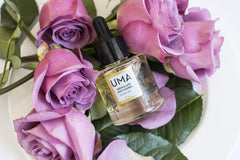 UMA Absolute Anti Aging Face Oil dropper releases oil for skin nourishment