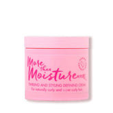Umberto Giannini More Than Moisture Cream bottle for lightweight hydration and effortless curl definition.