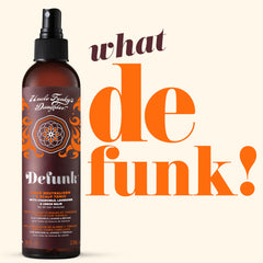 Uncle Funky's Daughter Defunk spray bottle releasing mist to refresh hair.