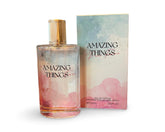 United Scents Amazing Things Pour Femme bottle with watercolor pink-blue design enhances daily elegance.