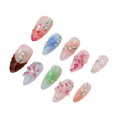 UNIYVOH almond press-on nails with 3D flower design for a chic look.