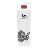 Unwash Anti-Residue Cleanse bottle pour shows clarifying action for buildup removal.
