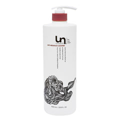 Unwash Anti-Residue Cleanse bottle pour shows clarifying action for buildup removal.
