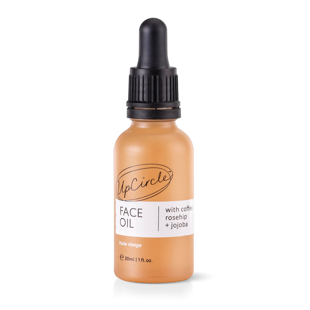 UPCIRCLE coffee oil serum bottle showcases antioxidant hydration for all skin types.