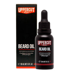 Uppercut Deluxe Beard Oil bottle dispensing a lightweight, non-greasy formula.