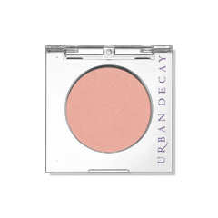 Urban Decay 24/7 Eyeshadow Single Introvert peach matte swatch shows vibrant, crease-free color.