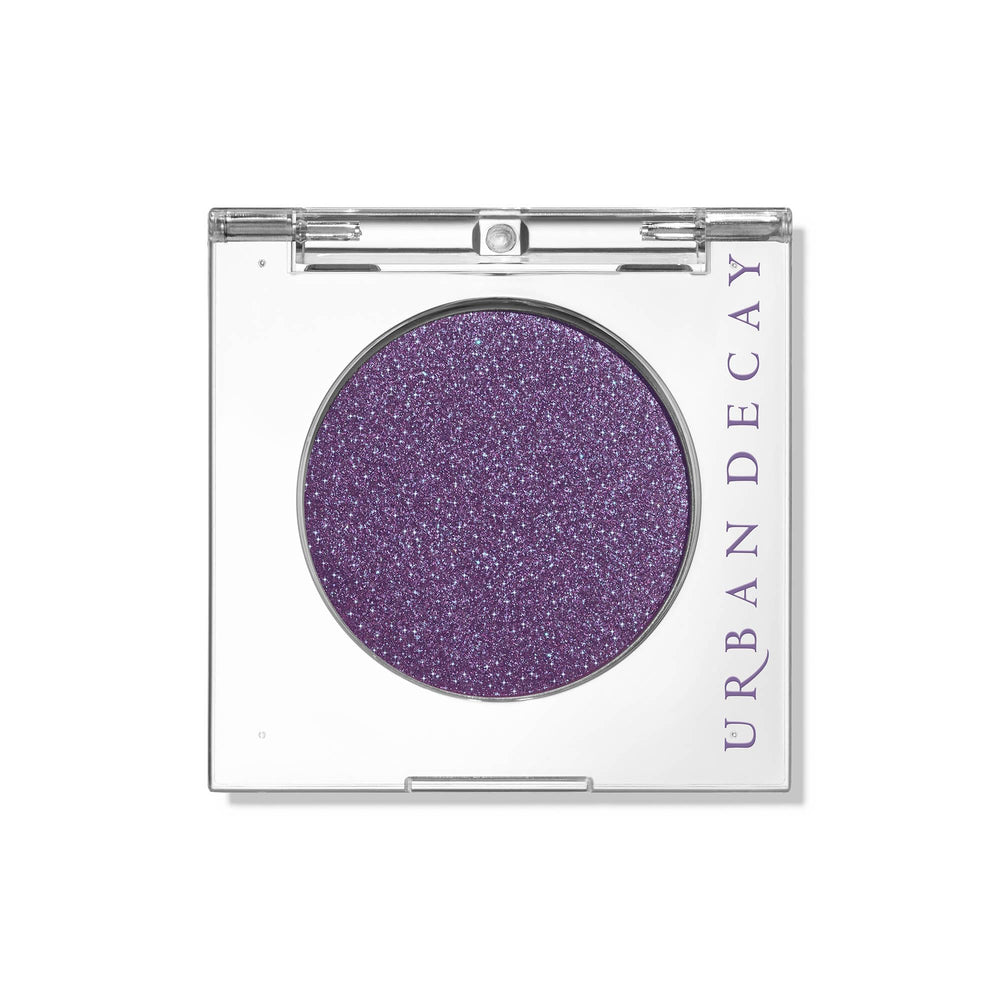 Urban Decay 24/7 Eyeshadow compact front view shows deep purple shimmer with blue shift and bold payoff.