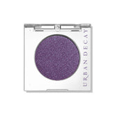 Urban Decay 24/7 Eyeshadow compact front view shows deep purple shimmer with blue shift and bold payoff.