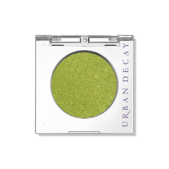 Urban Decay 24/7 single in Freak lime green shimmer for bold, crease-free color.