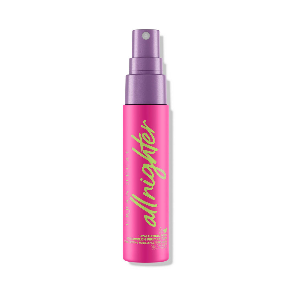 Urban Decay All Nighter setting spray bottle applying a dewy finish