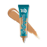 Urban Decay Hydromaniac bottle closeup shows hydrating glow and vegan formula.