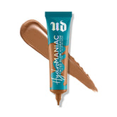 Urban Decay Hydromaniac bottle front view showing dewy, buildable coverage for dry skin.